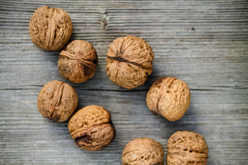 walnuts on old wooden background