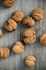 walnuts on old wooden background