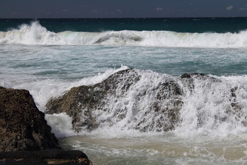 Sea foam on the rocks