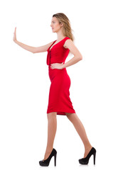 Young woman in red dress isolated on white