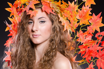 Woman with leaves in nature concept