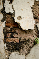 Eroded Textured Vintage Colonial Wall  in Asia with Brick and Stucco eroded and weathered