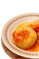 Stuffed paprika with minced meat served on the plate