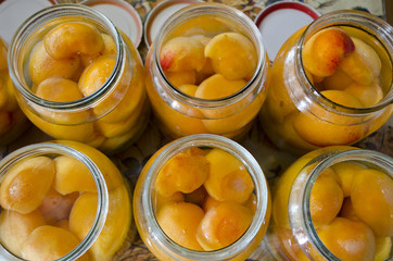 Homemade cooked apricot compote in the glass jar