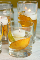 candles on white wooden table
