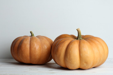 pumpkin on white wooden table