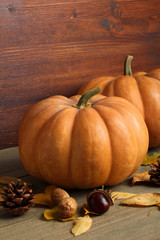 pumpkin on wooden brown background