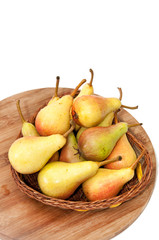 Fresh pears in the wooden basket
