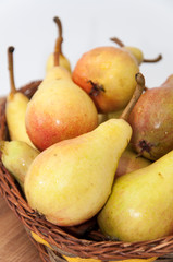 Fresh pears in the wooden basket