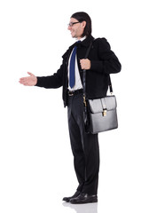 Young businessman holding briefcase isolated on white