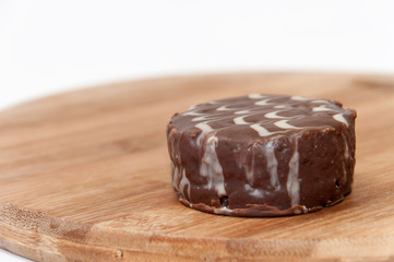 Chocolate muffin on the wooden board