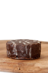 Chocolate muffin on the wooden board