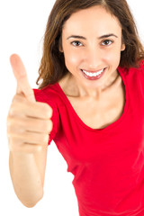 Woman giving thumbs up, focus on the model