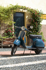 Classic scooter parked in the street