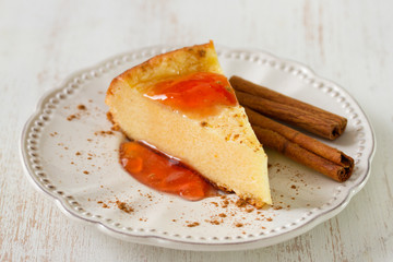 cottage cheese cake with jam and cinnamon on plate