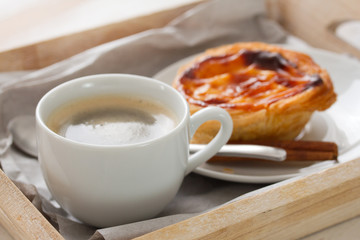 portuguese cookie pasteis de nata with coffee