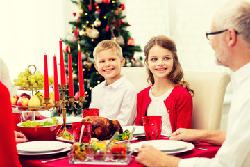 smiling family having holiday dinner at home