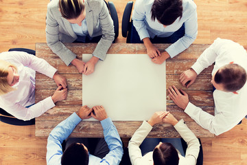 close up of business team sitting at table