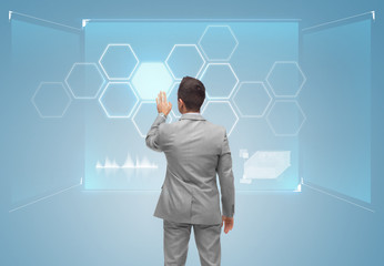 businessman virtual screen with network