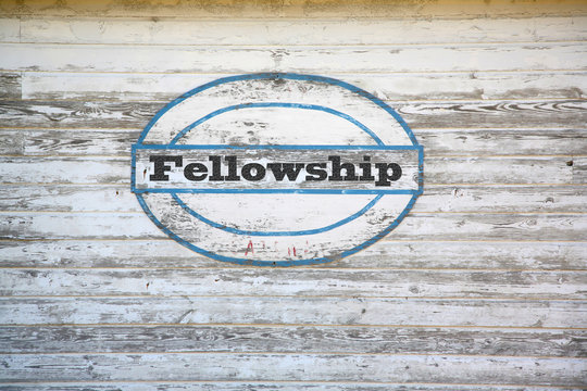 
Fellowship Concept - Road Sign On Shed Side
