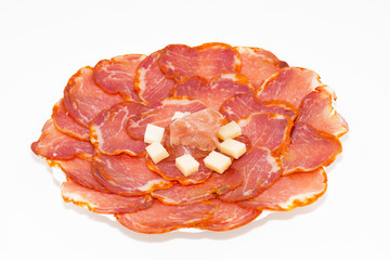 Lomo ibérico con queso de oveja y jamón.