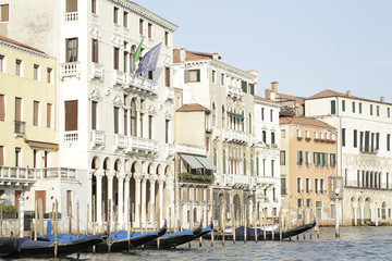 Fototapeta na wymiar Beautiful classical buildings and gondolas on the Grand Canal, Venice, Italy