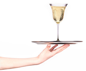 Waitress holding tray with glass of champagne