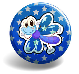 Blue dragonfly on round badge