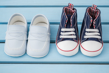 Pair of Dark Blue, White Baby Sneakers and Blue Baby Shoes