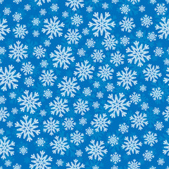 Christmas seamless pattern with white blue snowflakes