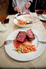 Steak. People eat meat since the time of the Ice Age. That's when , according to anthropologists , the man walked away from the plant-based diet and started to eat meat . 