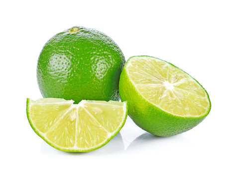 Limes with slices  isolated on white background