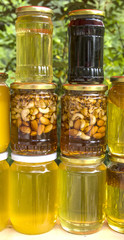 Homemade jars of different types of honey