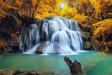 Fototapeta na wymiar Waterfall Huay Mae Kamin, beautiful waterfall in autumn forest