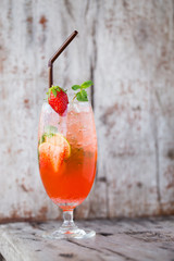 Strawberry soda backdrop wooden floors.