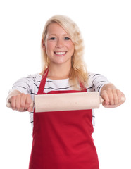 Frau mit Sch&uuml;rze h&auml;lt eine Teigrolle