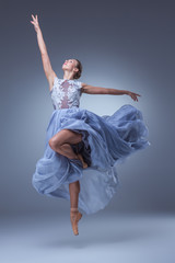 The beautiful ballerina dancing in blue long dress  © master1305