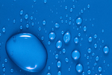 Drops of water on a color background. Shallow depth of field. Se