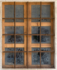 old window with metal bars