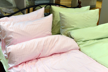 Fototapeta na wymiar Pillows on the bed in bedroom