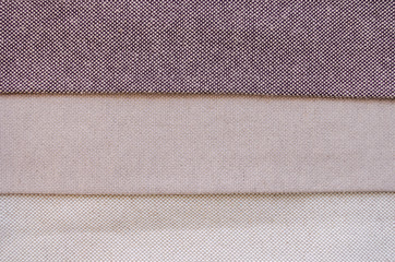 Fototapeta premium Scraps of colorful rough textile texture