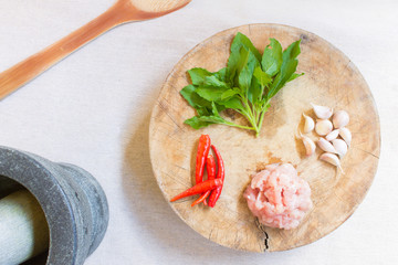 Thai Food Ingredient Include Pork and Basil and Chili and Garlic on Wooden Cutting Board
