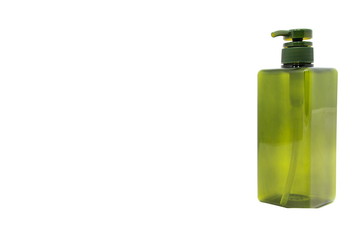 Green cosmetic plastic bottle with dispenser pump.