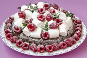 Oatmeal cake with marshmallow and raspberry   