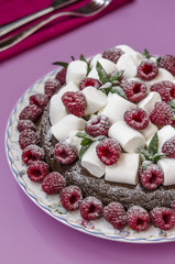 Oatmeal cake with marshmallow and raspberry   