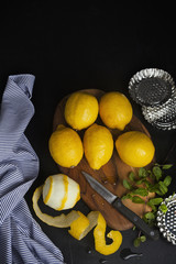 lemons and mint for desserts. ingredients and metal molds for sw