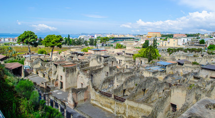 ruins of herculaneum destroyed by vesuvius volcano are less famous than ruins of pompeii, but nevertheless they also create compact area of former buildings attracting thousands of tourist every year