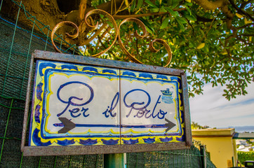 Typical ceramic signs showing direction to the most famous capri destinations.