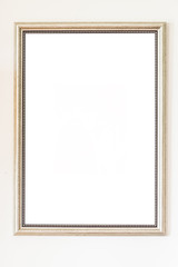Blank frame on white wall background