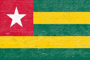 Togo - National flag on Brick wall